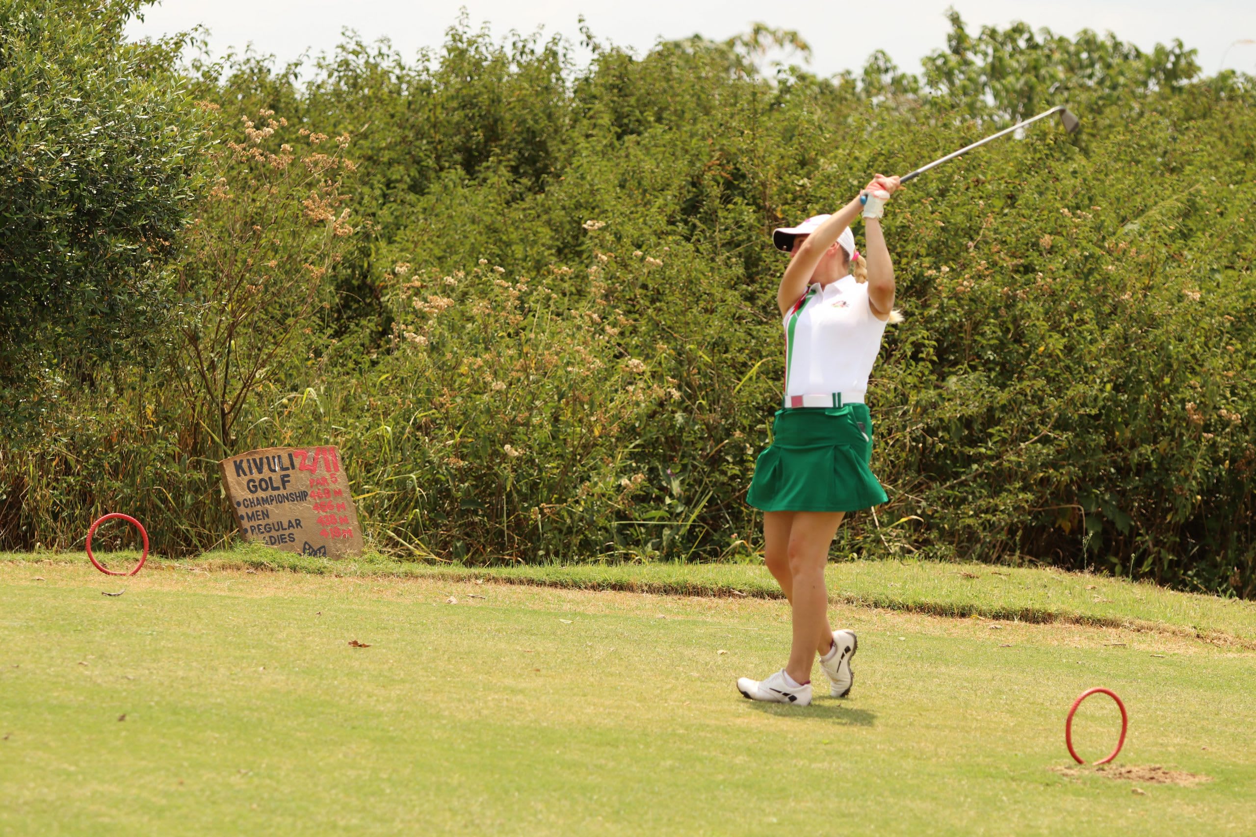 Pro Golfer Teeing Off at Hole 1