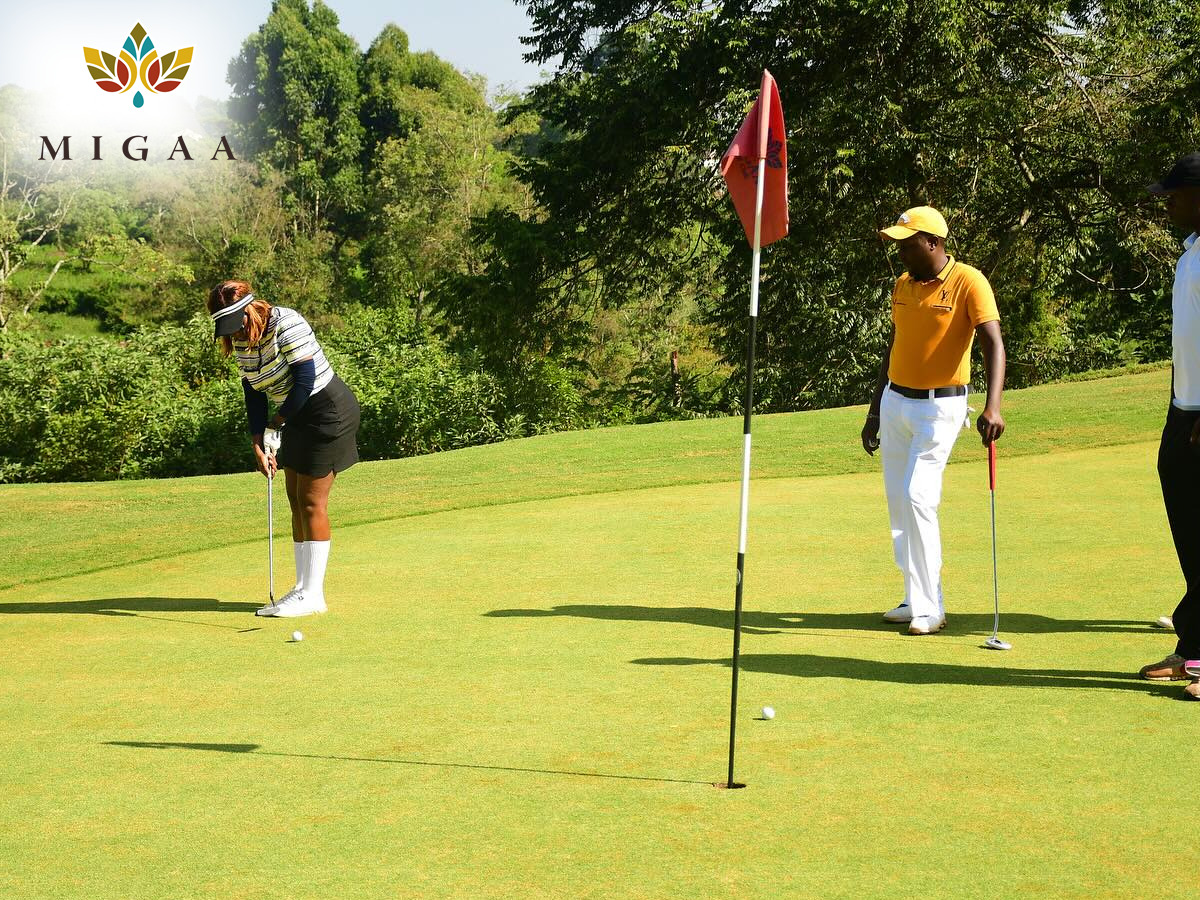 Golf training session with a coach guiding participants on improving their swing and technique.